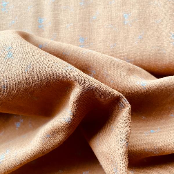 Camel double gauze fabric with silver flowers