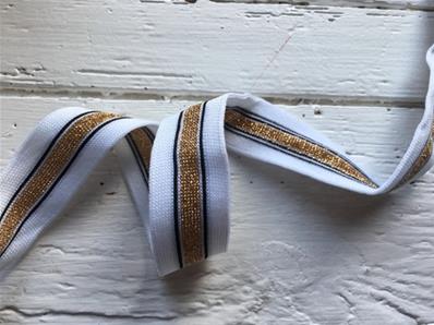 Gold stripe on white jersey band